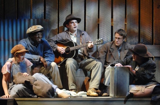Photo by Glenn Asakawa Megan Smith, Daver Morrison, Sam Misner as Woody Guthrie, Matthew Mueller and Lisa Asher in Woody Guthrie's American Song. Photo by courtesy of the Colorado Shakespeare Festival.