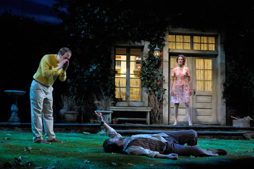 Reg (Anthony Fusco, left) and his wife, Sarah (Marcia Pizzo), bring a drunk and rowdy Norman (Manoel Felciano) into the garden for some fresh air. Photo by Kevin Berne.
