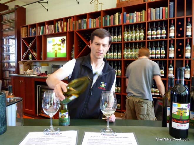 Scott pours wine at L'Ecole winery while he educates us on the Walla Walla wine region. Scott pours wine at L'Ecole winery while he educates us on the Walla Walla wine region.