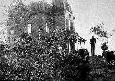 Psycho: Normal stands out front the house on the hill.