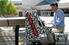 Luke Jerram plays one of his street pianos in front of San Jose's MLK library