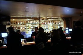 The bar is a hot spot with its expanse and mood lighting The bar is a hot spot with its expanse and mood lighting