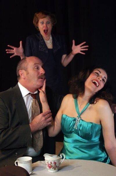 Womanizer Mr Malcomb (left to right - Rich Dymer) has a good time with Mrs. Shankland (Nicole Martin) while his girlfriend Miss Cooper (Ruth Sieber) looks on in Hillbarn Theatre's Separate Tables.