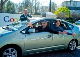 Eric, Larry and Sergey in a self-driving car. Eric, Larry and Sergey in a self-driving car.