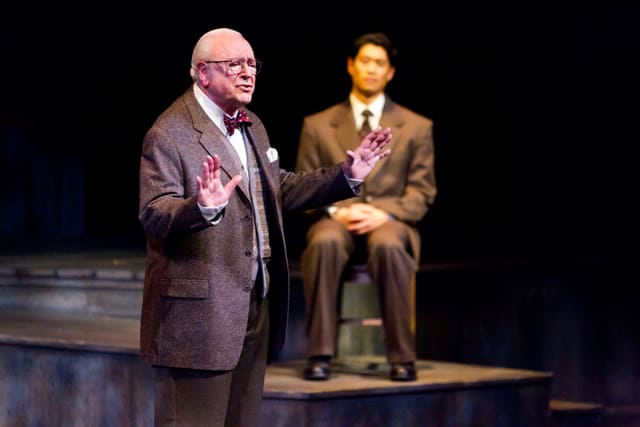 Attorney Nels Gudmundsson (Edward Sarafian) defends Kabuo Miyamoto (Tim Chiou), accused of murder Attorney Nels Gudmundsson (Edward Sarafian) defends Kabuo Miyamoto (Tim Chiou), accused of murder