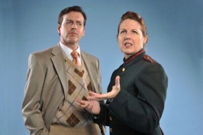 Ninotchka (Lee Ann Payne) explains the Communist theory of romance to a skeptical Steve Canfield (Ian Simpson) in the song 'It's a Chemical Reaction, That's All.' from 42nd Street Moon’s production of Cole Porter’s SILK STOCKINGS. Photo by DavidAllenStudio.com.
