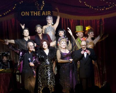 Entire Cast of On The Air Bottom row, left to right: Mat Plendl, Duffy Bishop, Kristin Clayton, Geoff Hoyle. Middle row, left to right: Christopher Phi, Bernard Hazens, Manuela Horn, Wayne Doba, Andrea Conway-Doba Top: Elena Gatilova