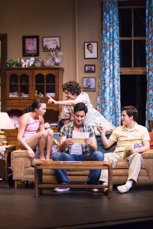 Somewhere - TheatreWorks Alejandro (Michael Rosen, center) reads a letter from his father Pepe while his sister Rebecca (Michelle Cabinian, left), mother Inez (Priscilla Lopez, back), and brother Francisco (Eddie Gutierrez, right) listen in SOMEWHERE, playing Jan 16 - Feb 10, 2013 at TheatreWorks.