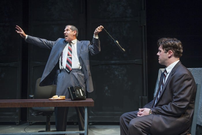 Roy Cohn (Alex Perez) is a wheeler-dealer, observed by Joe Pitt (Dan Martin)