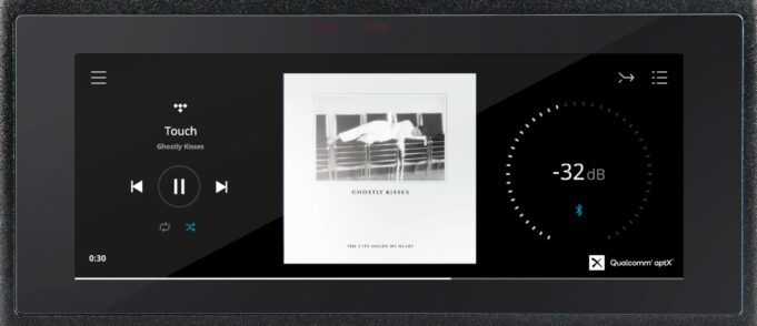 NAD M10 V2 close-up of the 7-inch IPS display user interface and album art