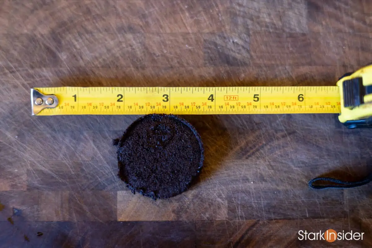 Examining a used espresso puck on the Jura Z10.