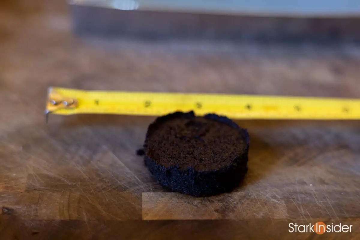 Examining a used espresso puck on the Jura Z10.