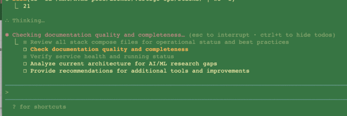 Code terminal showing AI-generated to-do list and progress tasks