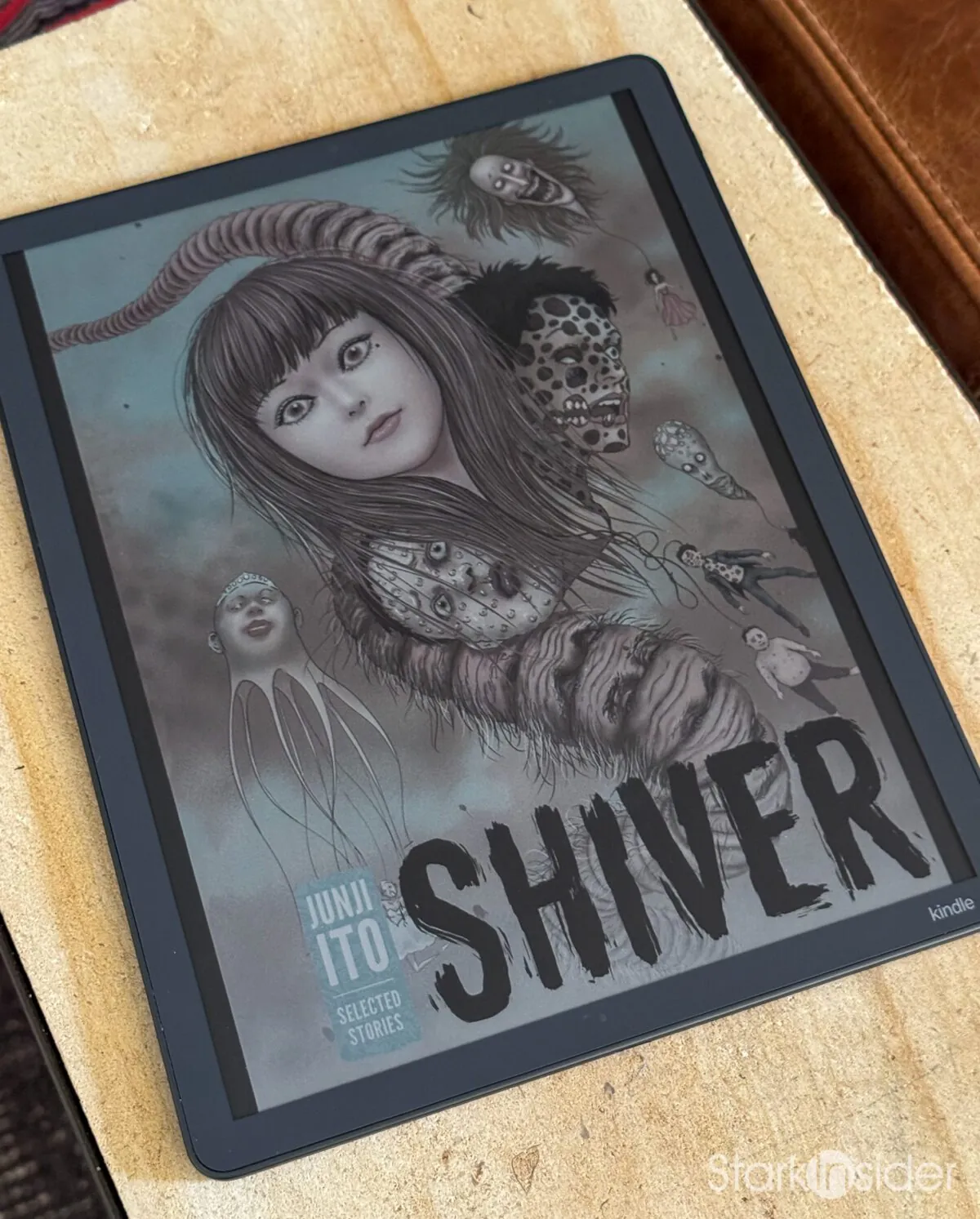 Kindle Scribe Colorsoft displaying the color cover of Junji Ito's Shiver on its 11-inch Kaleido 3 e-ink screen