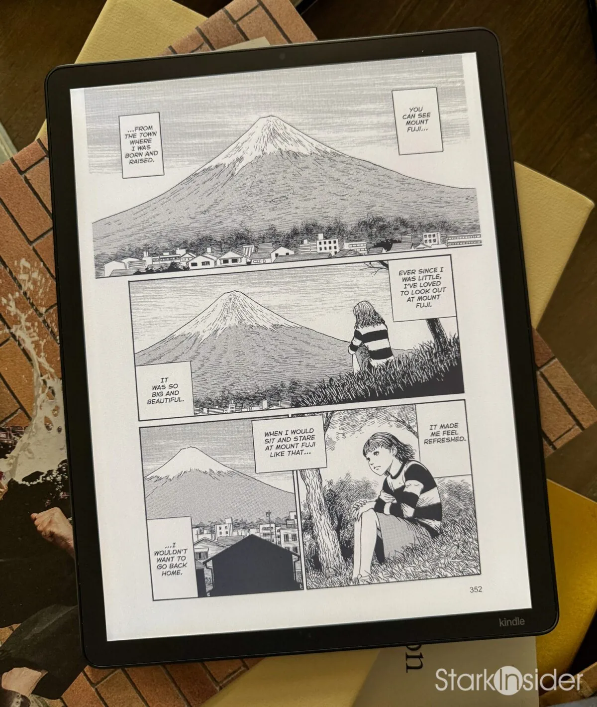 Black and white Junji Ito manga page showing Mount Fuji panels on the Kindle Scribe Colorsoft 11-inch display