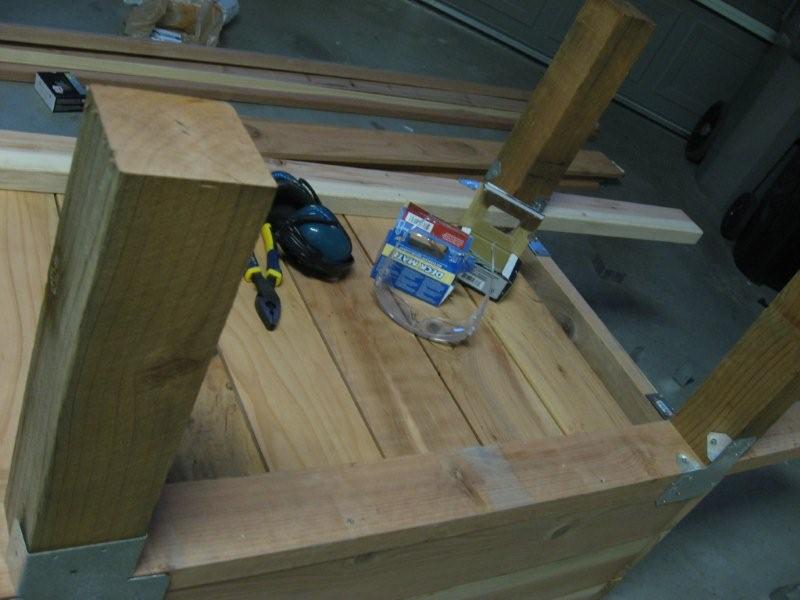 Legs on a DIY wooden vegetable planter box